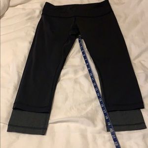 2 pairs size 8 mid-rise Lululemon leggings